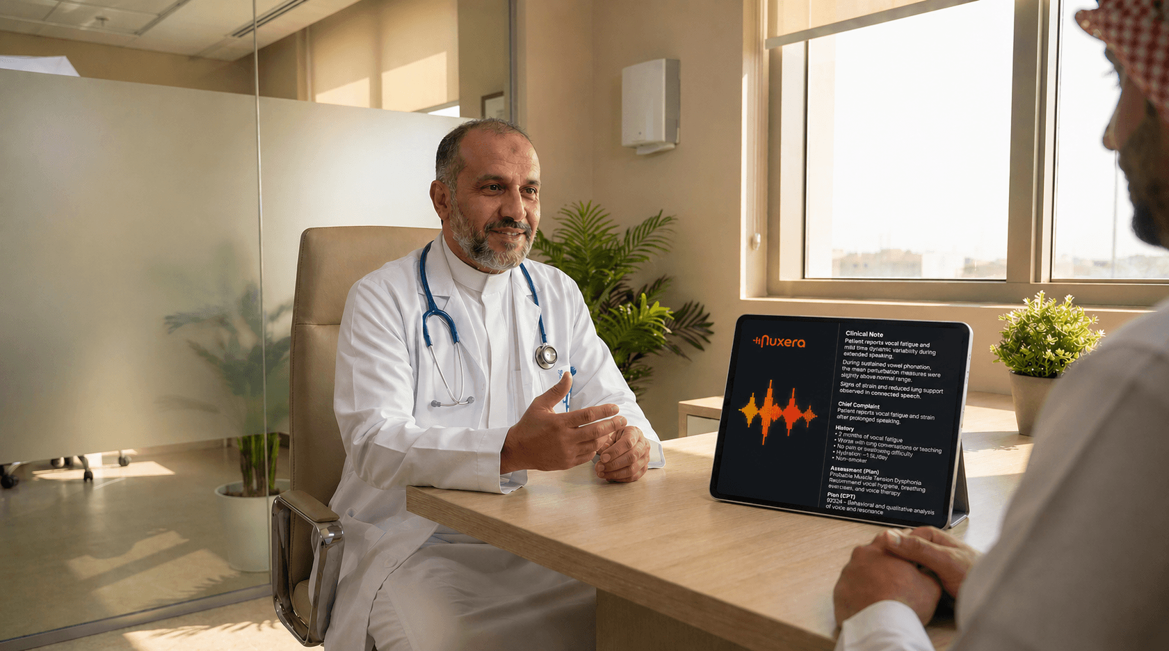 Saudi doctor using SERA AI for voice documentation during patient consultation